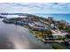 Panoramic aerial view of waterfront condos with easy access to beaches and a private marina at 4310 Falmouth Dr # 105, Longboat Key, FL 34228