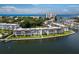 Aerial view of waterfront condos with boat docks and stunning water views at 4310 Falmouth Dr # 105, Longboat Key, FL 34228