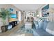 Comfortable living room featuring stylish furniture and coastal decor at 4310 Falmouth Dr # 105, Longboat Key, FL 34228