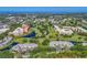 Community aerial shot with a building circled, showing the proximity to golf courses and lakes at 4550 Pinebrook Cir # 608, Bradenton, FL 34209