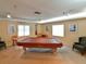 Spacious game room with a pool table and comfortable seating at 4550 Pinebrook Cir # 608, Bradenton, FL 34209