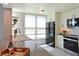 Well-lit kitchen with modern appliances, white cabinets, and lots of natural light at 4550 Pinebrook Cir # 608, Bradenton, FL 34209