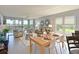 A combined living room and dining area with a view and plenty of natural light at 4550 Pinebrook Cir # 608, Bradenton, FL 34209