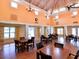Large recreation room with tables, chairs, and wood flooring at 4550 Pinebrook Cir # 608, Bradenton, FL 34209