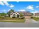 Inviting single-story home showcasing a well-maintained lawn and attached two-car garage at 4621 34Th E Ct, Bradenton, FL 34203
