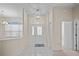 Inviting foyer with tile flooring, chandelier, and view into adjacent rooms at 4621 34Th E Ct, Bradenton, FL 34203