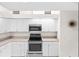 Well-lit kitchen featuring sleek appliances and ample counter space at 4621 34Th E Ct, Bradenton, FL 34203