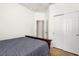 Bedroom with gray comforter, closet, and neutral walls at 4718 Arbor Gate Dr, Bradenton, FL 34203