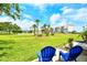 Enjoy the lush backyard with plenty of space for outdoor activities and relaxing on the lawn at 4840 Gulf Of Mexico Dr # Villa 15, Longboat Key, FL 34228