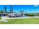Well-maintained boat dock with several boats, providing convenient access to the beautiful waterfront at 4840 Gulf Of Mexico Dr # Villa 15, Longboat Key, FL 34228