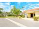 Charming villa exterior featuring well-maintained landscaping and easy access at 4840 Gulf Of Mexico Dr # Villa 15, Longboat Key, FL 34228