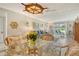 Inviting living and dining area with water views at 4840 Gulf Of Mexico Dr # Villa 15, Longboat Key, FL 34228
