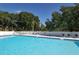 Community swimming pool perfect for relaxation and recreation at 4920 Woodhurst Dr, Sarasota, FL 34243