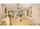 Dining room showcasing an open layout, neutral tones, and seamless flow into the living spaces at 4920 Woodhurst Dr, Sarasota, FL 34243
