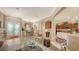 Inviting living room with easy access to dining, kitchen and outdoors at 4920 Woodhurst Dr, Sarasota, FL 34243