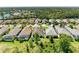 Aerial view of the home showing location, nearby landscaping, and community features at 5035 Tobermory Way, Bradenton, FL 34211