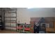 A garage with a white insulated garage door, storage units, and packing boxes at 5035 Tobermory Way, Bradenton, FL 34211