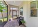 Covered patio with bench seating, a window, and views of the outdoors at 5035 Tobermory Way, Bradenton, FL 34211