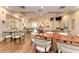 Elegant restaurant with a mix of tables and chairs and a bar area for a pleasant dining experience at 5035 Tobermory Way, Bradenton, FL 34211