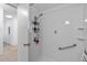 Updated bathroom with a walk-in shower and grab bar at 505 47Th Avenue W Dr, Bradenton, FL 34207