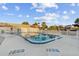 Community pool with lounge chairs and a view of palm trees at 505 47Th Avenue W Dr, Bradenton, FL 34207