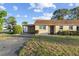 Inviting single-story home featuring an attached carport and a neatly landscaped front lawn at 505 47Th Avenue W Dr, Bradenton, FL 34207