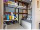 Laundry room with shelving and full size washer and dryer at 505 47Th Avenue W Dr, Bradenton, FL 34207