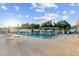 Community pool with lounging chairs and shade at 505 47Th Avenue W Dr, Bradenton, FL 34207