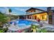 Stunning backyard with a sparkling pool and spa, ideal for entertaining and enjoying outdoor leisure at 5500 Merrimac Dr, Sarasota, FL 34231