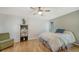 Cozy bedroom with a ceiling fan and natural light at 5500 Merrimac Dr, Sarasota, FL 34231