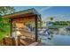 Covered boat lift providing convenient access to the water for boating enthusiasts and canal adventures at 5500 Merrimac Dr, Sarasota, FL 34231