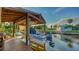 Well-maintained boat lift, perfect for protecting your watercraft and enjoying waterfront living on the canal at 5500 Merrimac Dr, Sarasota, FL 34231