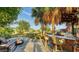 Cozy outdoor fire pit area with comfortable seating, ideal for enjoying cool evenings and outdoor gatherings at 5500 Merrimac Dr, Sarasota, FL 34231