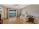 Bright living room with a sliding glass door that opens to a patio at 5500 Merrimac Dr, Sarasota, FL 34231
