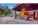 Entertaining patio area with outdoor seating, a wooden ceiling, and an airy feel at 5500 Merrimac Dr, Sarasota, FL 34231