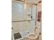 Bathroom features a glass enclosed marble tiled shower with a rainfall shower head, and neutral accents at 5855 Midnight Pass Rd # 621, Sarasota, FL 34242
