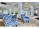Elegant lobby with comfortable furniture, modern design, pillars, and plenty of space for residents at 5855 Midnight Pass Rd # 621, Sarasota, FL 34242