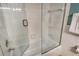 Well-maintained tub and shower combination with glass door at 5916 Midnight Pass Rd # 404, Sarasota, FL 34242