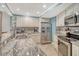 Modern kitchen features granite countertops, stainless steel appliances, and ample cabinet space at 5916 Midnight Pass Rd # 404, Sarasota, FL 34242