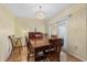 Formal dining room with chandelier and French doors at 6207 Courtside Dr # 23, Bradenton, FL 34210