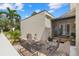 Cozy patio with comfortable seating, ideal for relaxation and enjoying the outdoors at 6207 Courtside Dr # 23, Bradenton, FL 34210