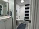 Clean bathroom featuring a tub with a shower, a vanity, and simple decor at 7150 N Tamiami Trl # S-623, Sarasota, FL 34243