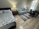 Quaint studio apartment featuring sleeping, seating, and dining area with plenty of natural light at 7150 N Tamiami Trl # S-623, Sarasota, FL 34243