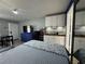 Functional studio with a bed, TV, kitchenette, and compact living area for comfort at 7150 N Tamiami Trl # S-623, Sarasota, FL 34243