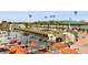 Charming waterfront resort with lush landscaping, private boat dock, and relaxing lounge areas at 7150 N Tamiami Trl # S-623, Sarasota, FL 34243