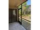 Enclosed patio space with screened in area at 7273 Cloister Dr # 121, Sarasota, FL 34231