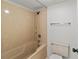 A clean bathroom shows a standard shower over tub, toilet, and wall mounted towel rack at 7500 40Th W Ave # 108, Bradenton, FL 34209