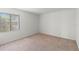 Neutral bedroom with carpet and a window, offering a clean slate for personalization and comfort at 7500 40Th W Ave # 108, Bradenton, FL 34209