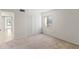 Bedroom featuring a closet with bright natural light, and neutral finishes for a serene space at 7500 40Th W Ave # 108, Bradenton, FL 34209