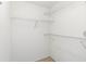 Closet with multiple shelves providing ample storage space in a functional layout at 7500 40Th W Ave # 108, Bradenton, FL 34209